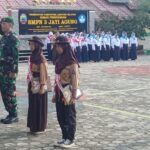 Pos Ramil Jati Agung Koramil 0421-09/ Tanjung Bintang Adakan Upacara Bendera di SMPN 3 Jati Agung
