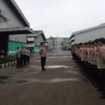 Kapolsek Cikande Pimpin Apel Pengamanan Aksi Unras Forum Komunikasi RT/RW Desa Sukatani di PT. SHCP Indonesia