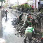 Karya Bhakti TNI Kodim 0410/KBL: Wujudkan Lingkungan Bersih, Bebas dari Banjir
