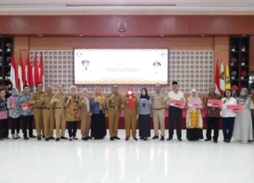 Walikota Eva Hadiri Perayaan Hari Koprasi Nasional dan UMKM Tingkat Kota Bandar Lampung
