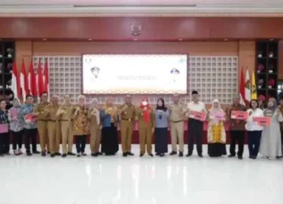 Walikota Eva Hadiri Perayaan Hari Koprasi Nasional dan UMKM Tingkat Kota Bandar Lampung