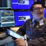 Wall Street Ditutup Bervariasi, Dow Jones Cetak Rekor Tertinggi